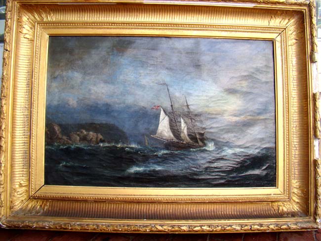 An oil painting on canvas of a Danish ship off the coast signed and dated "A. Probert 1905"